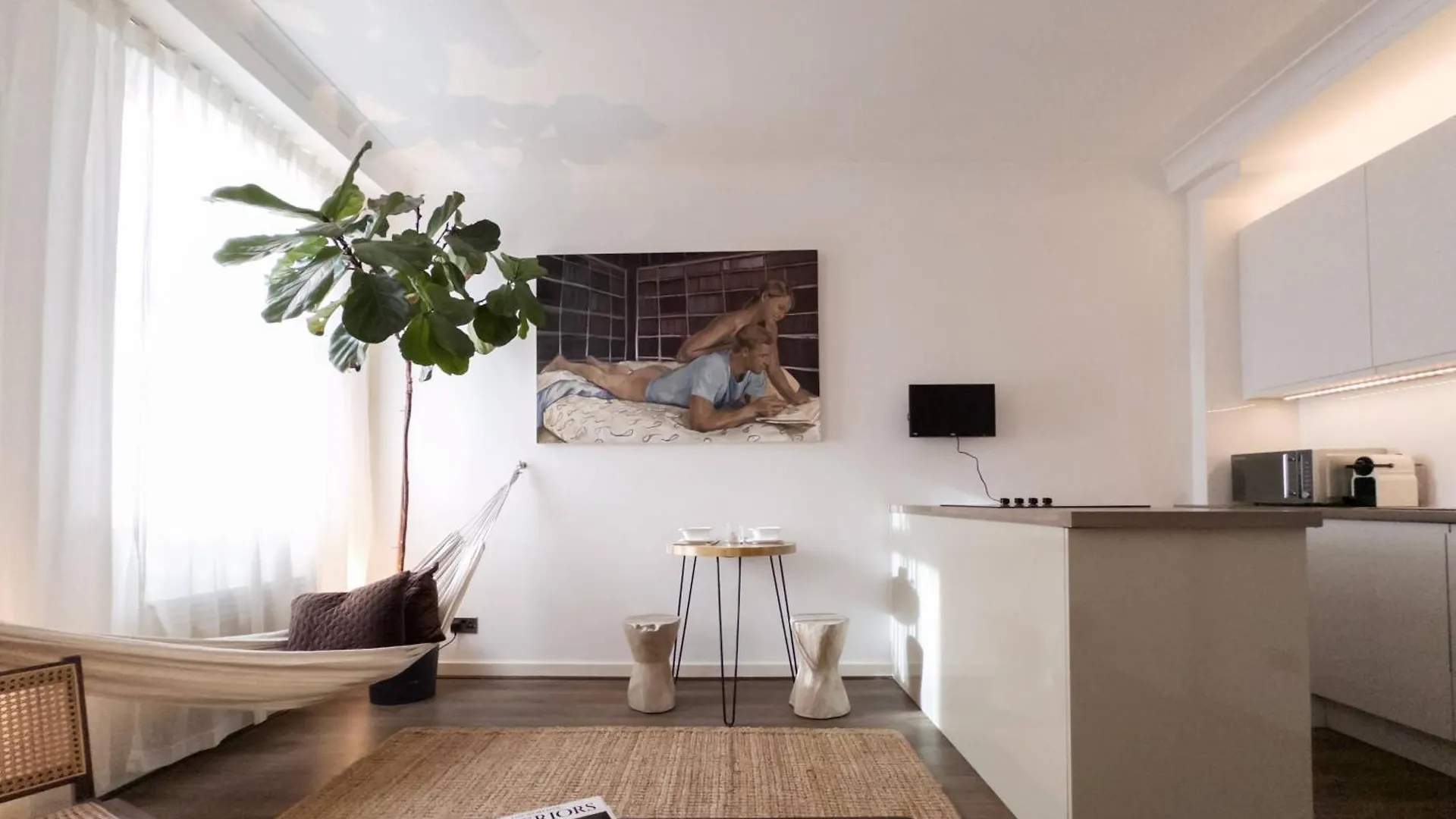 Tranquil Oasis W 100Inch Cinema & Hammock, By The Design Traveller Apartment London