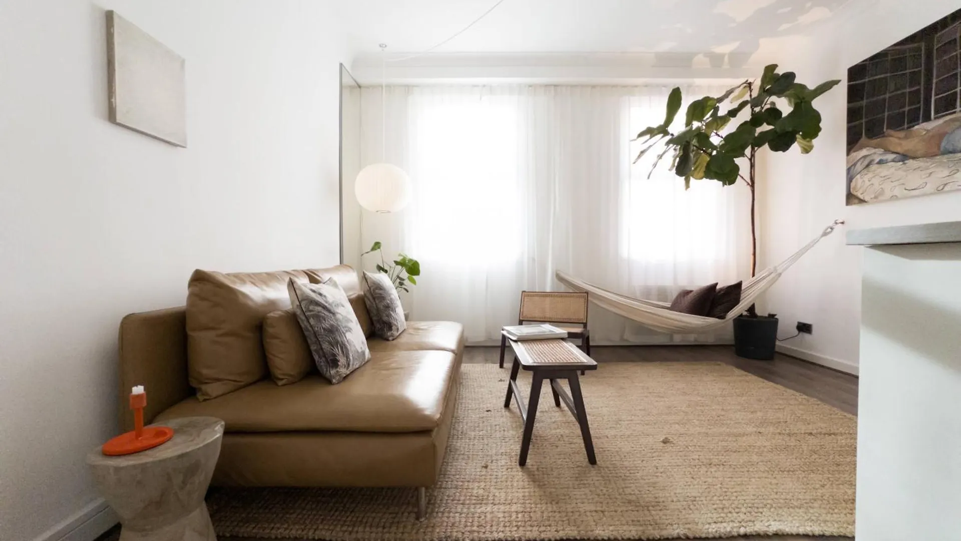 Tranquil Oasis W 100Inch Cinema & Hammock, By The Design Traveller contacts