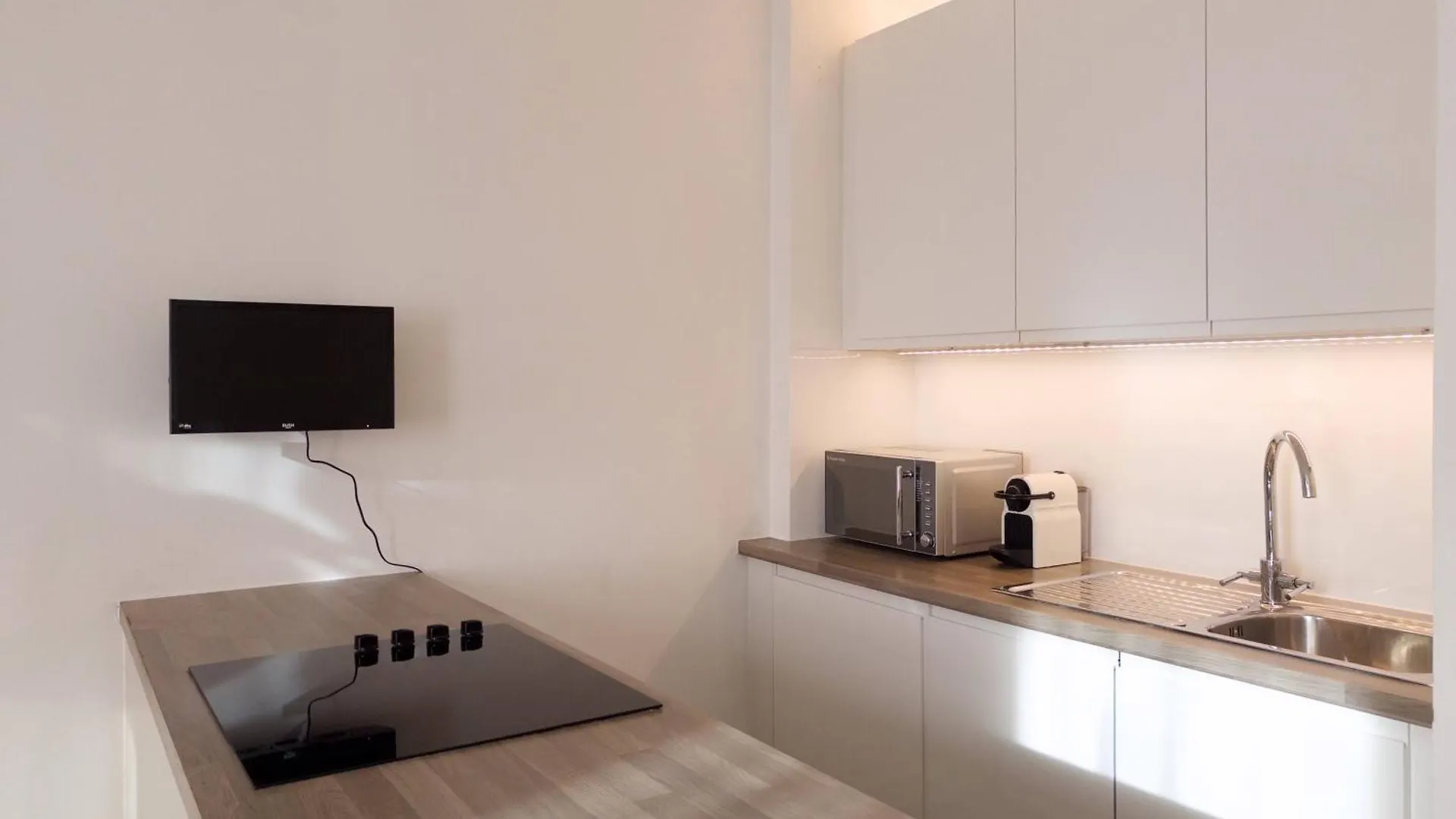 Tranquil Oasis W 100Inch Cinema & Hammock, By The Design Traveller Apartment London