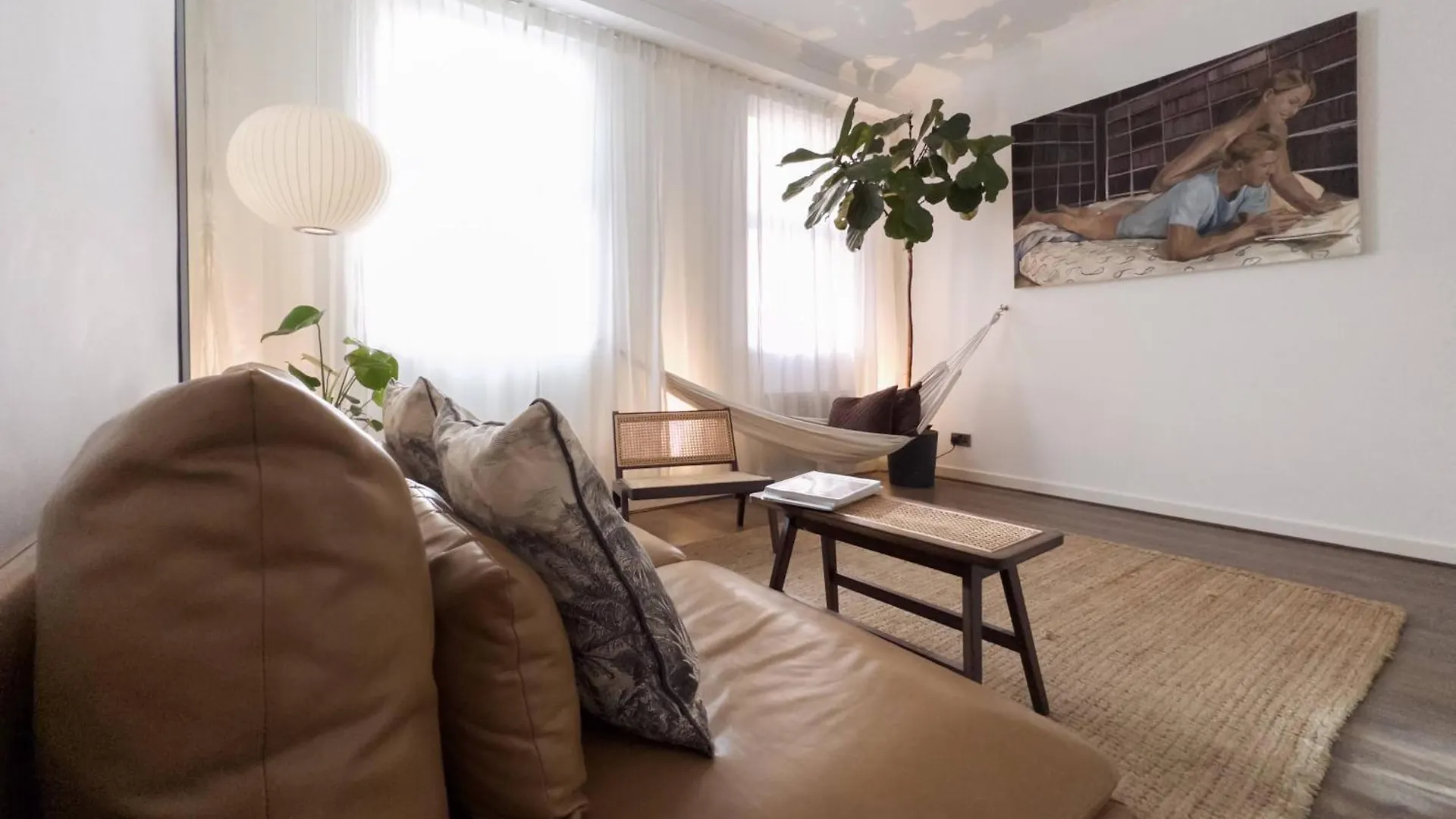 Tranquil Oasis W 100Inch Cinema & Hammock, By The Design Traveller Apartment London
